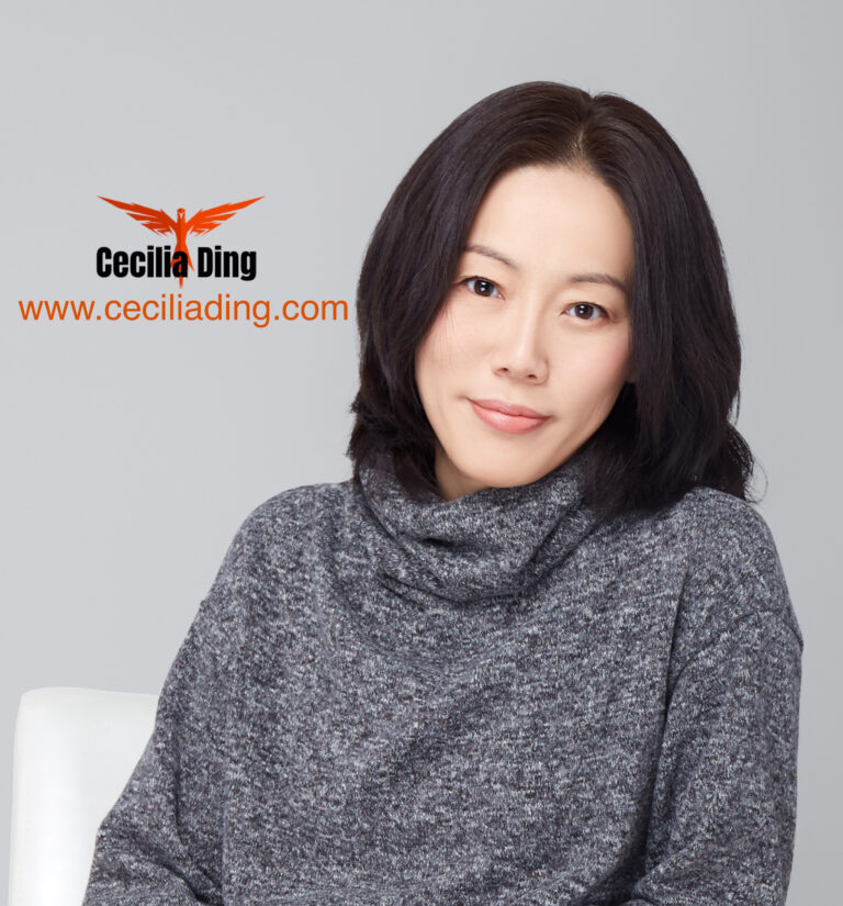 cropped headshot on chair with water mark